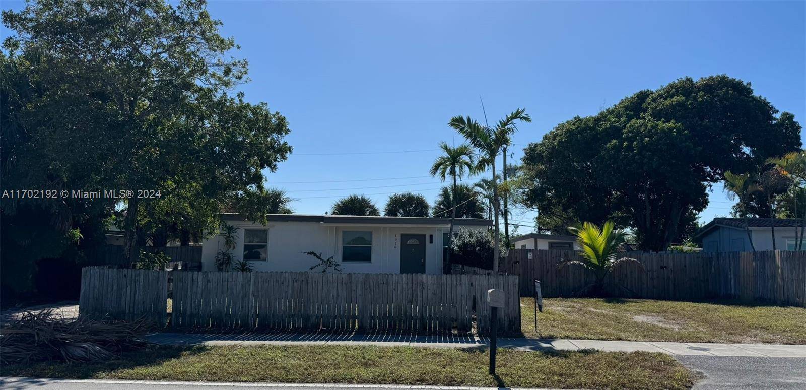 Cozy turnkey house on a massive lot with incredible development potential.