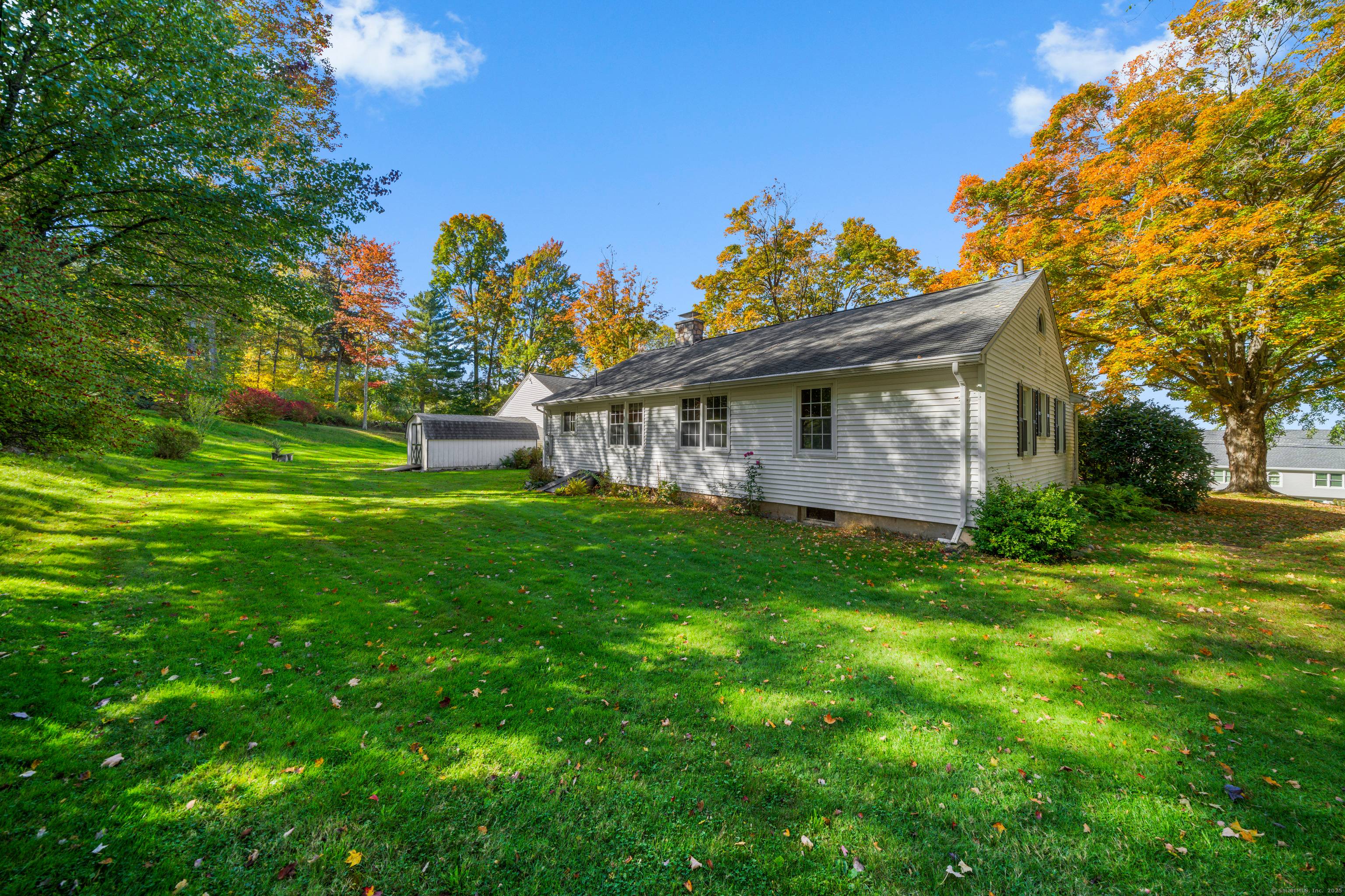 This charming ranch style home offers convenient one level living in a highly sought after neighborhood with beautiful seasonal views.