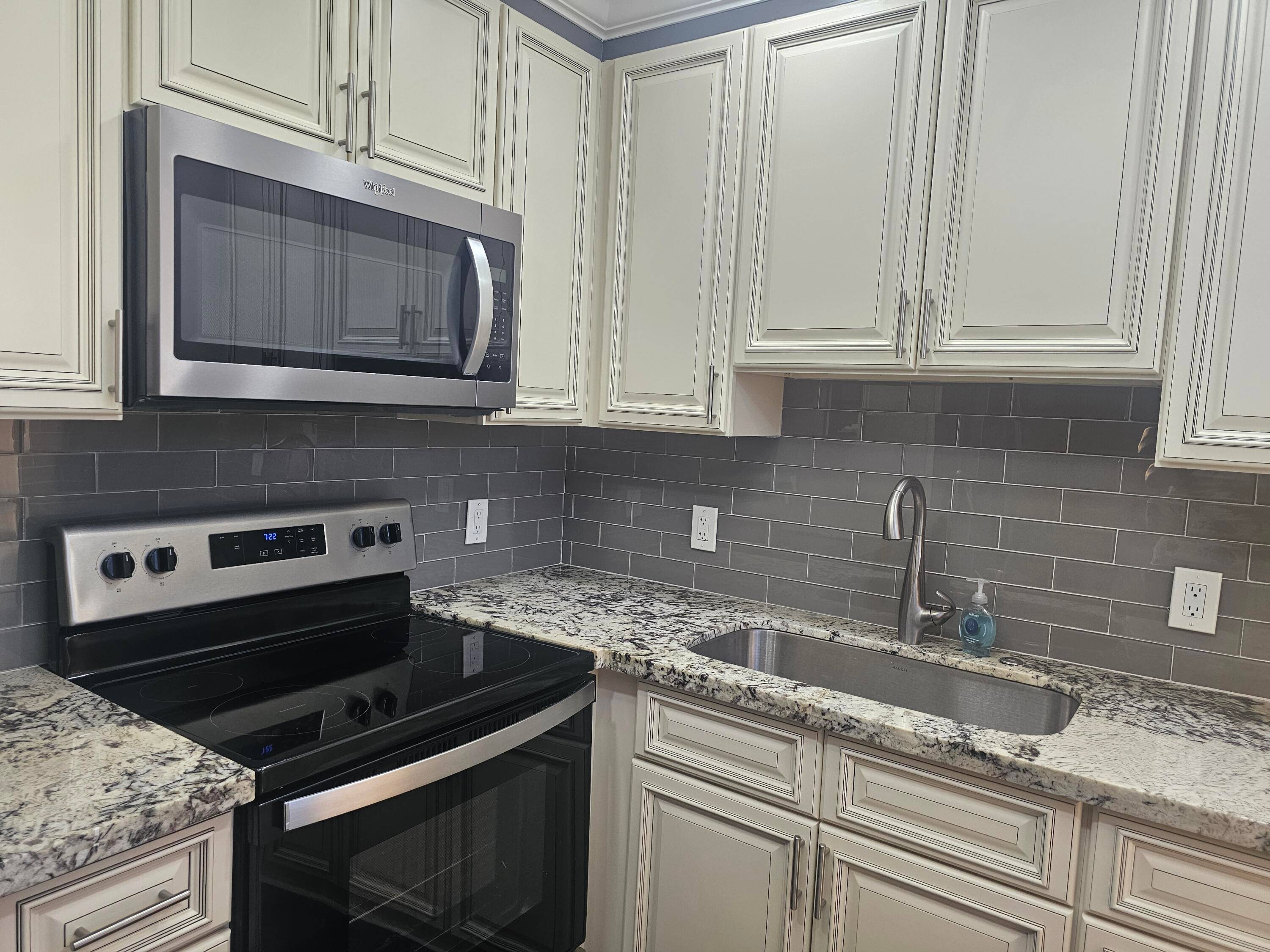 Welcome to this stunning corner unit offering abundant natural light, fresh updates, and a layout that truly feels like home.