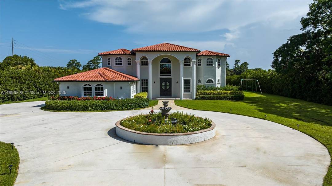 Experience water access luxury in this exquisite 8 bedroom estate offering over 5, 000 sq ft of living space on nearly 2.