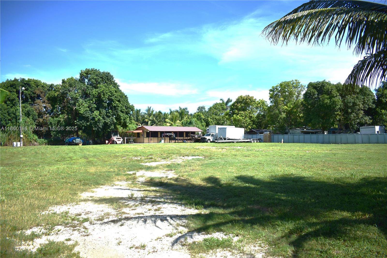1. 3 Acre Lot featuring a horse stable, fully fenced, with 24 hour security cameras and an automatic gate.