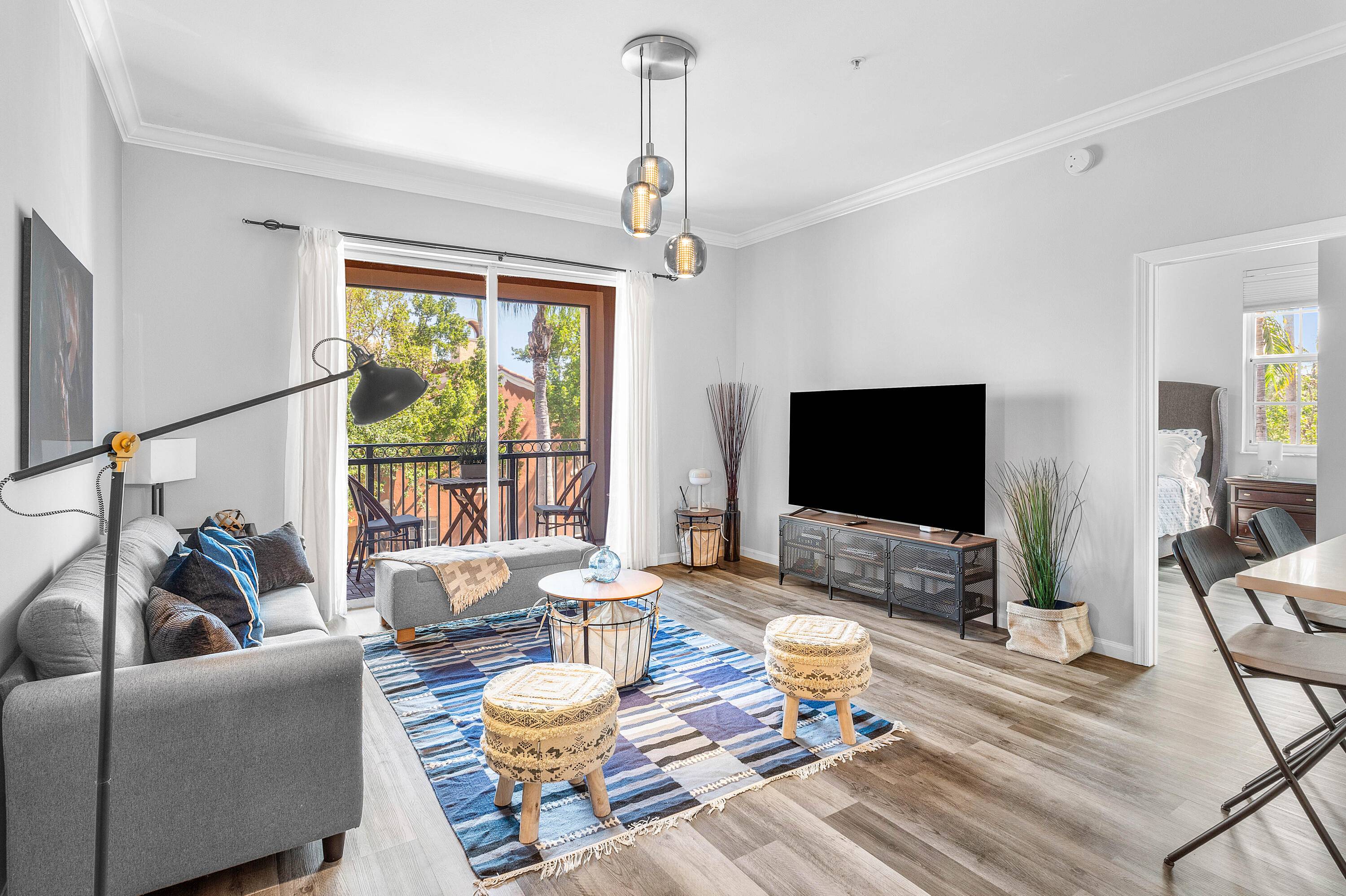 Turnkey and fully furnished, this charming condo in the sought after Saint Andrews at The Polo Club is the perfect seasonal home for equestrians.