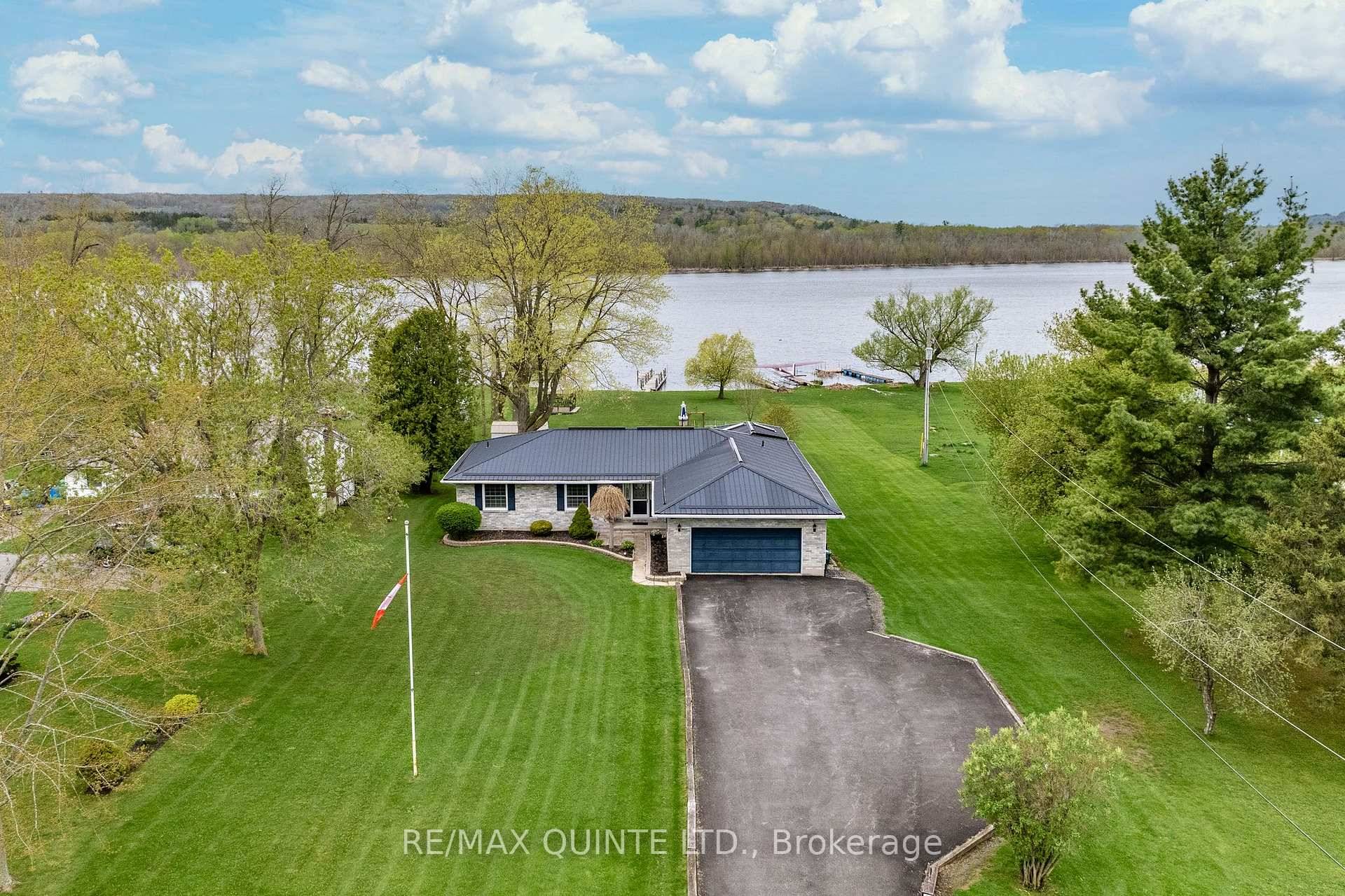On a sprawling waterfront lot along the Trent River, this brick bungalow offers more than just a place to live, it delivers a lifestyle.