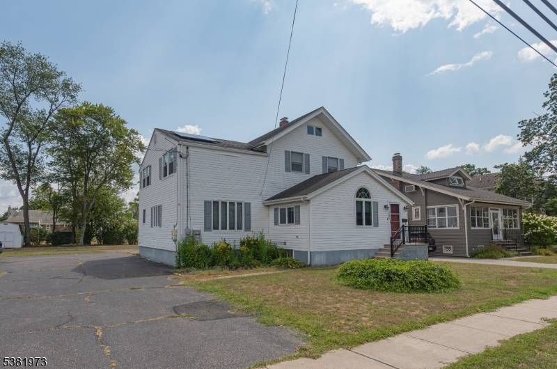 Step into timeless charm with this spacious 5 bedroom, 2.
