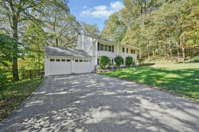 Welcome home to this inviting 4 bedroom, 2 bath bi level, set on a quiet cul de sac in one of the area's most desirable neighborhoods.