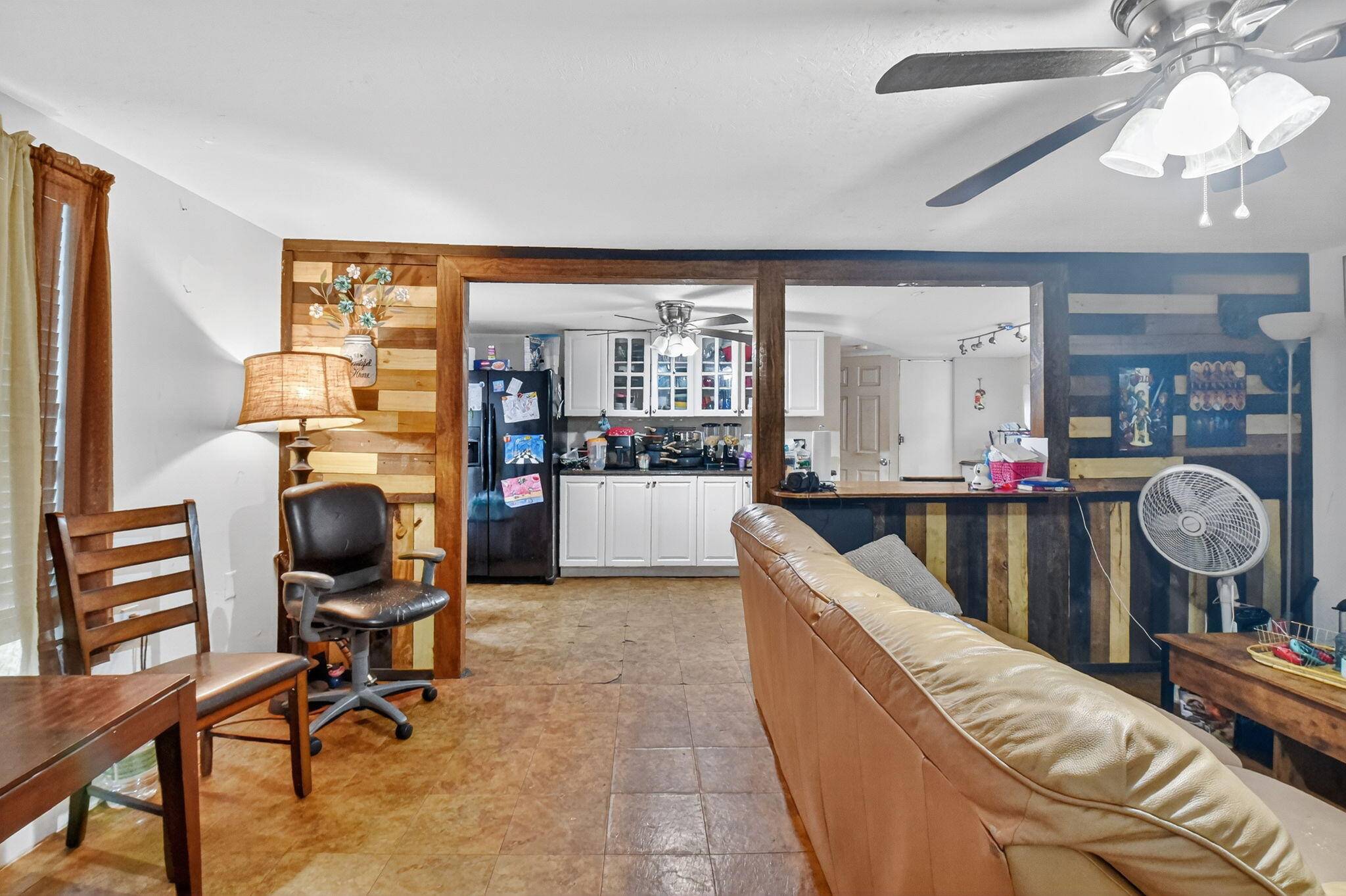 Welcome to this 2 bedroom, 2 bath fixer upper situated on a spacious double lot, offering endless potential for customization and expansion.