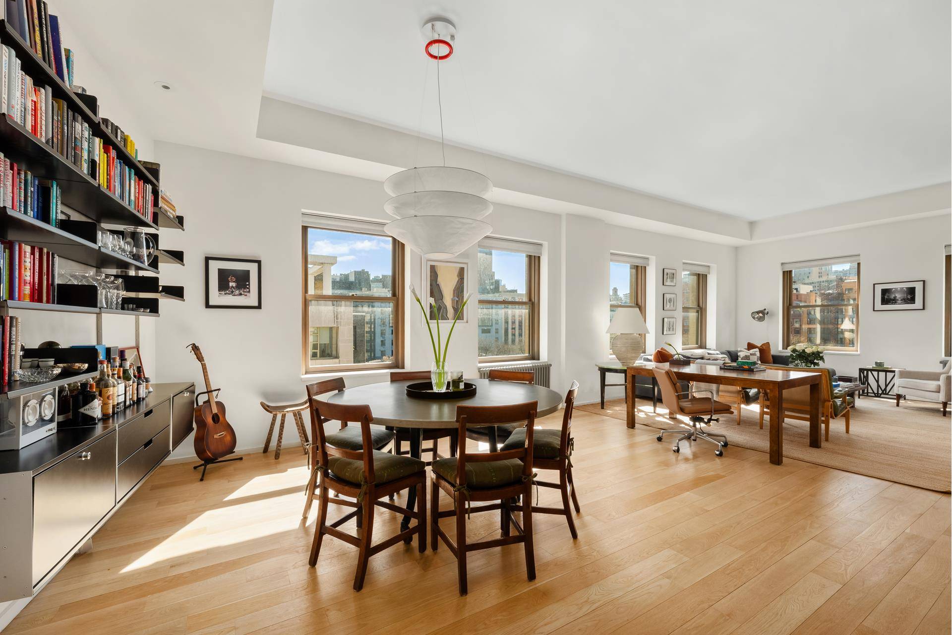 Penthouse A is a stunningly renovated corner loft offering 11 foot ceilings, six oversized windows facing east and south that bathe the home in beautiful natural light, and nearly 700 ...