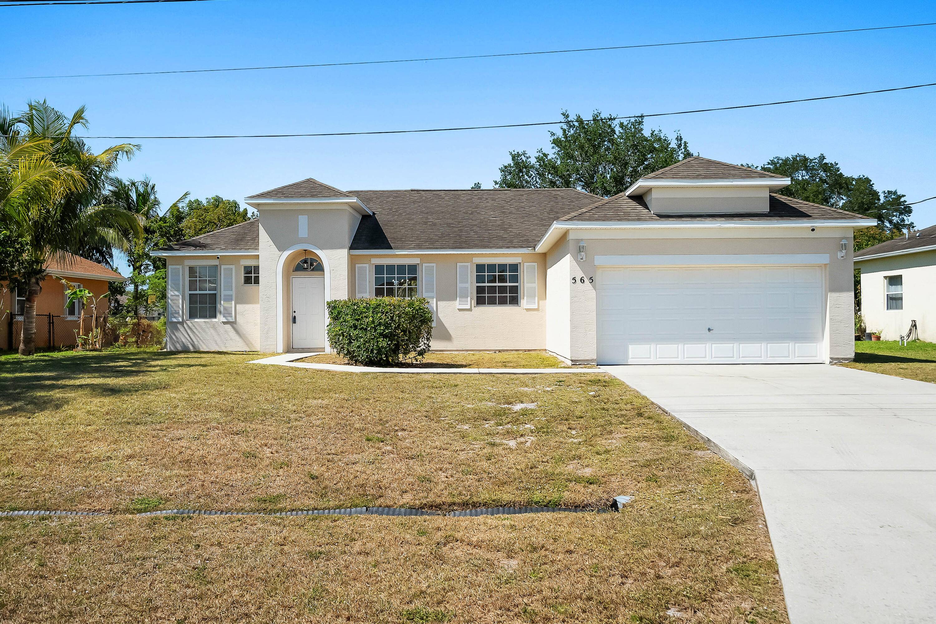 This Concrete Block 4 bedrooms and 2 bathrooms, this home showcases high ceilings, that create an airy, open feel.