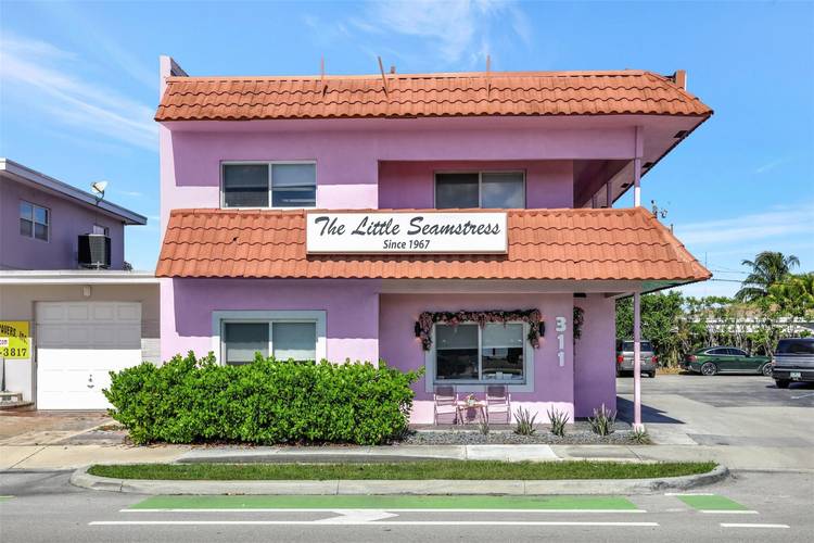 Free Standing 2 Story Building on Prospect Rd in Central Oakland Park Business District.
