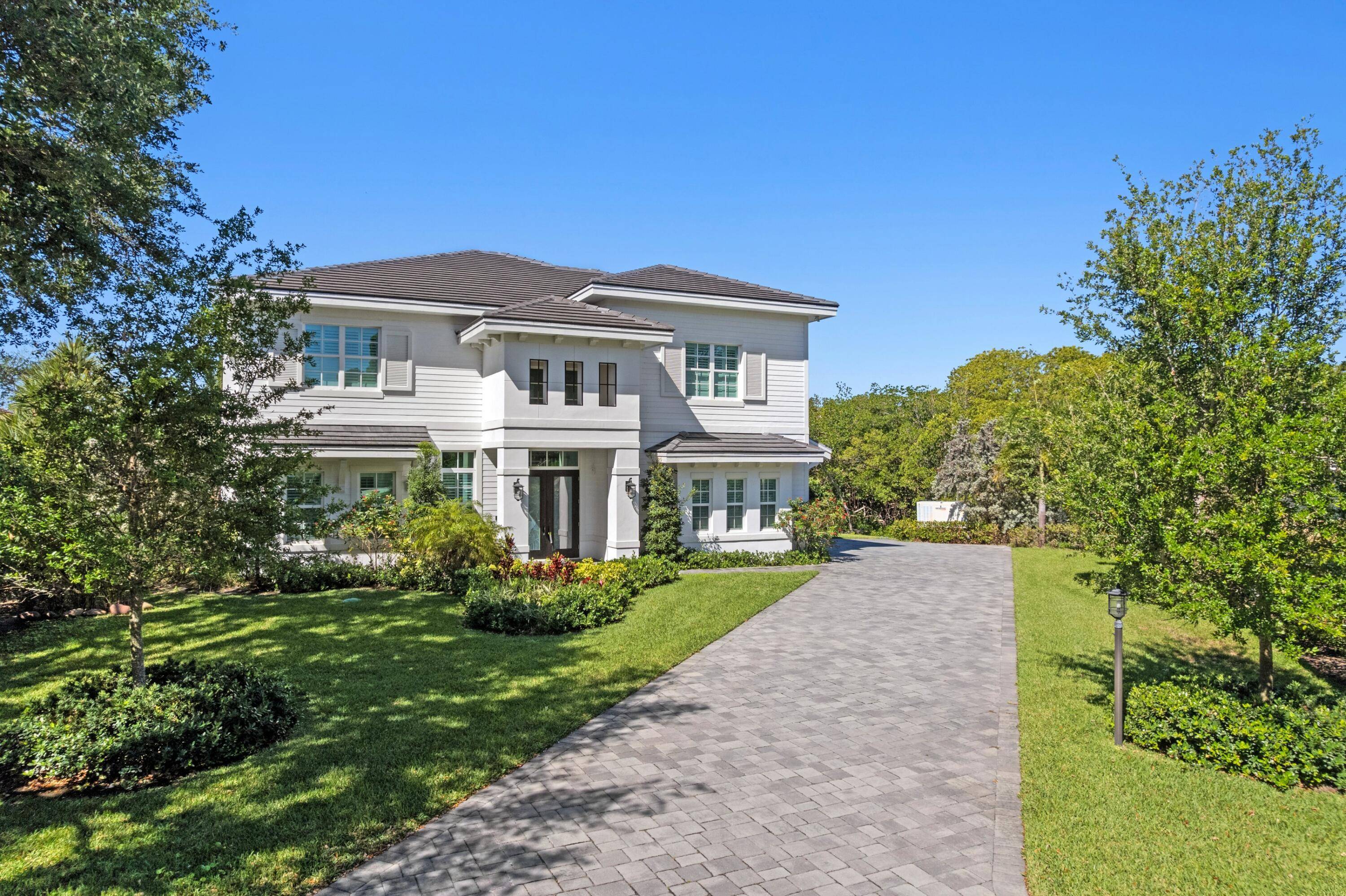 Welcome to this stunning New Construction 2022 masterpiece nestled on the picturesque Loxahatchee River with access to the intracoastal and ocean in the heart of Jupiter, Florida.