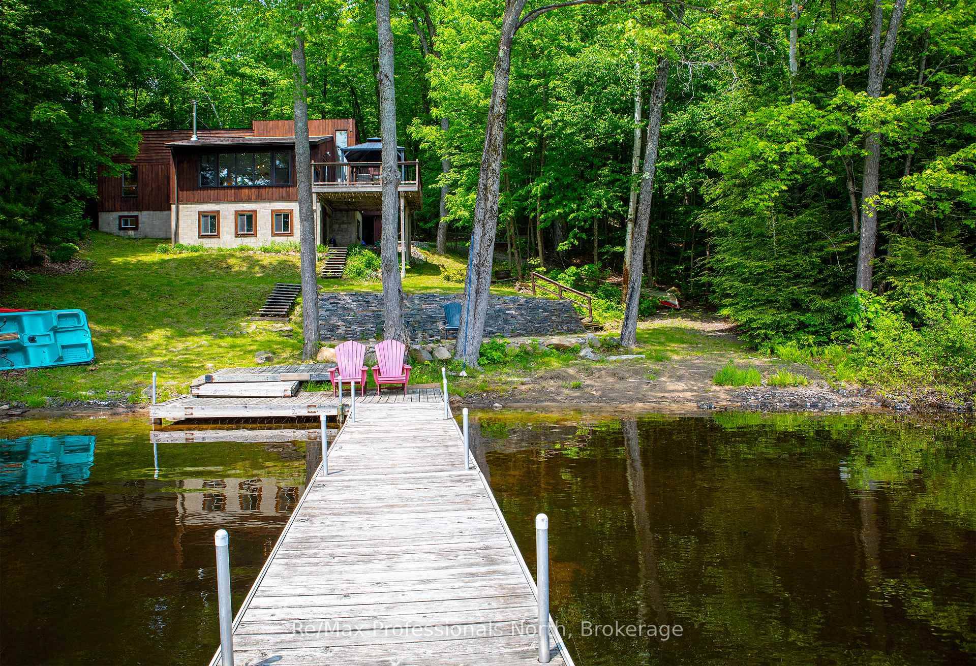 Bird Lake cottage, sand beach with shallow entry, expansive view from the deck onto the waterfront.