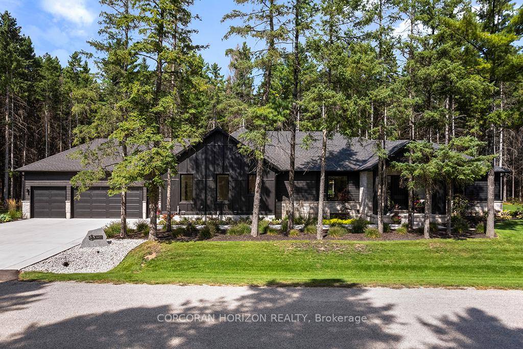 Welcome to 107 Louise Creek Crescent, a stunning 5 bedroom plus den, 5 bathroom bungalow perfectly situated on a quiet, tree lined street in Elmwood.