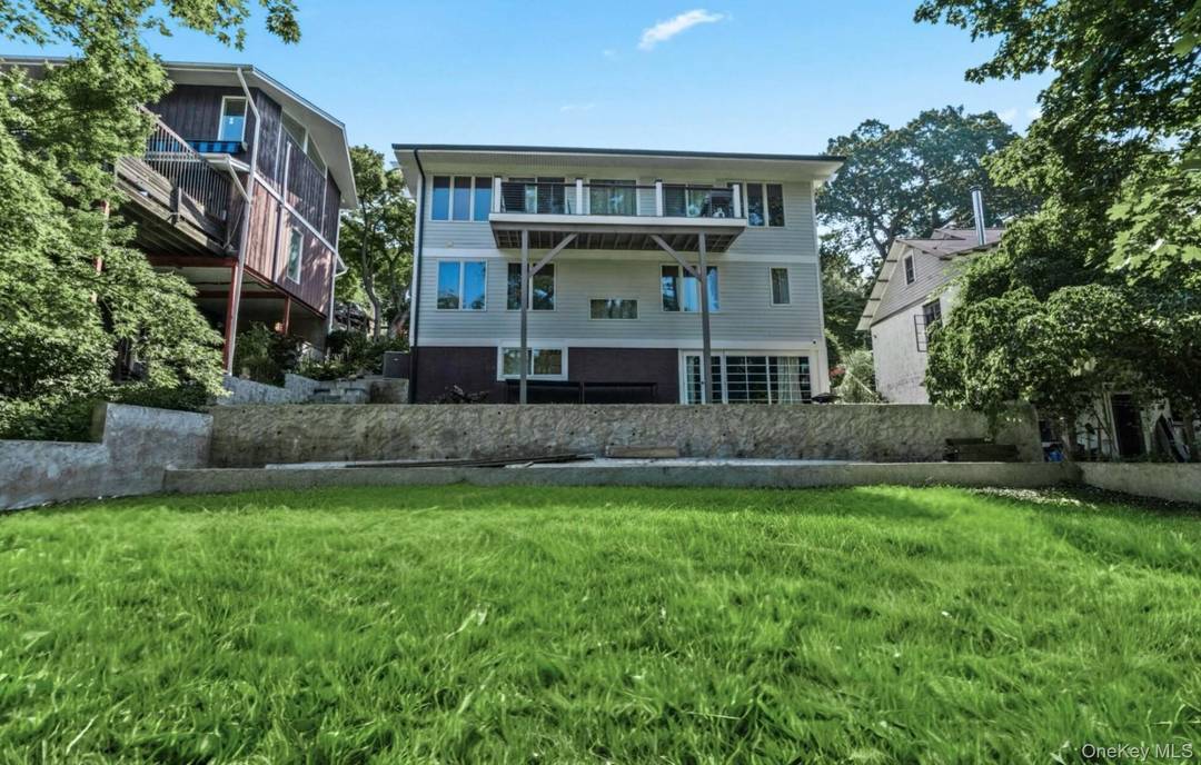 Quietly nestled just moments from Northport Harbor and the vibrant Village, this fully reimagined 3 bedroom, 2.