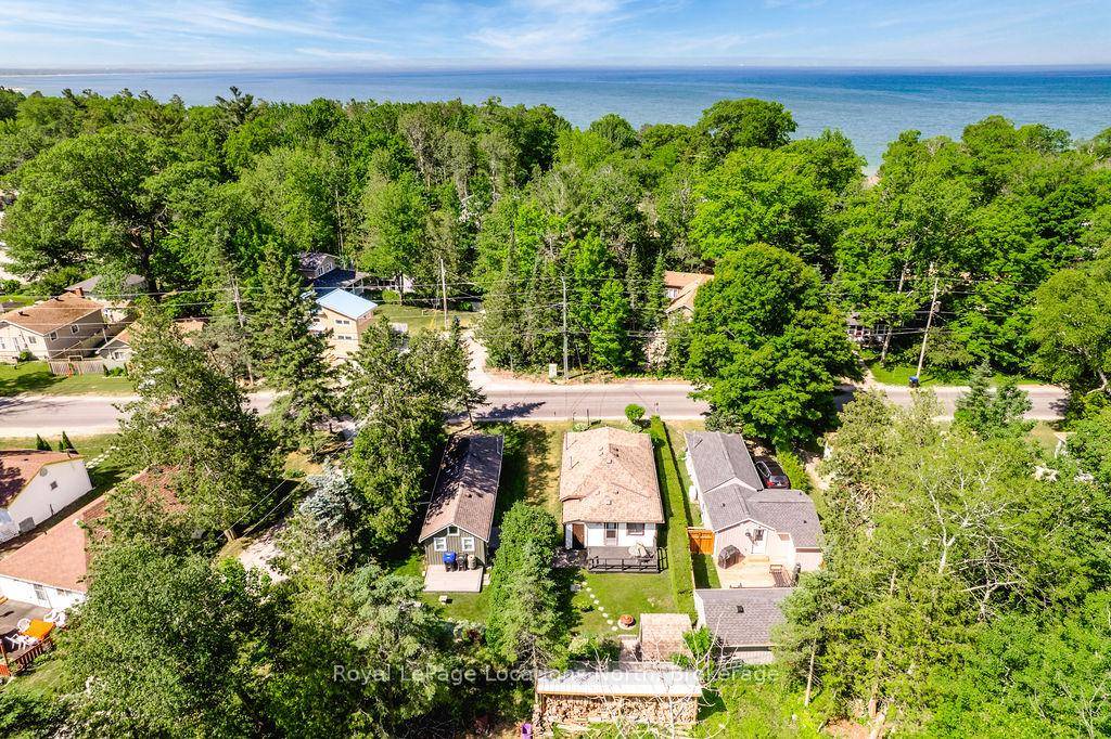 Welcome to this meticulously maintained 2 bedroom, 1 bathroom three season cottage, perfectly tucked away in one of the best pockets of Tiny Beaches.