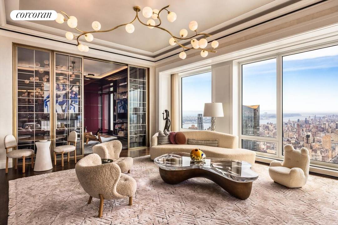 Perched on the 62nd floor of 220 Central Park South, this 5, 935 square foot simplex offers 125 linear feet of unobstructed frontage over Central Park, capturing sweeping views across ...