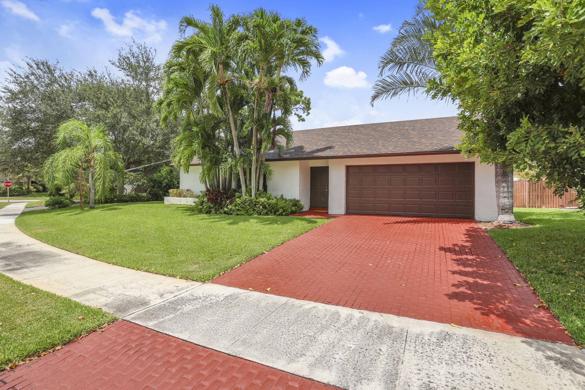 Beautiful home in pristine condition located in desirable Timbercreek neighborhood of central Boca Raton.