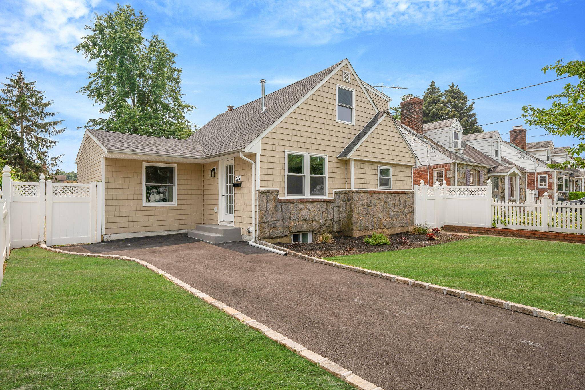 Fall in love with this fully renovated Expanded Cape in the heart of Hicksville, where modern upgrades meet timeless comfort.