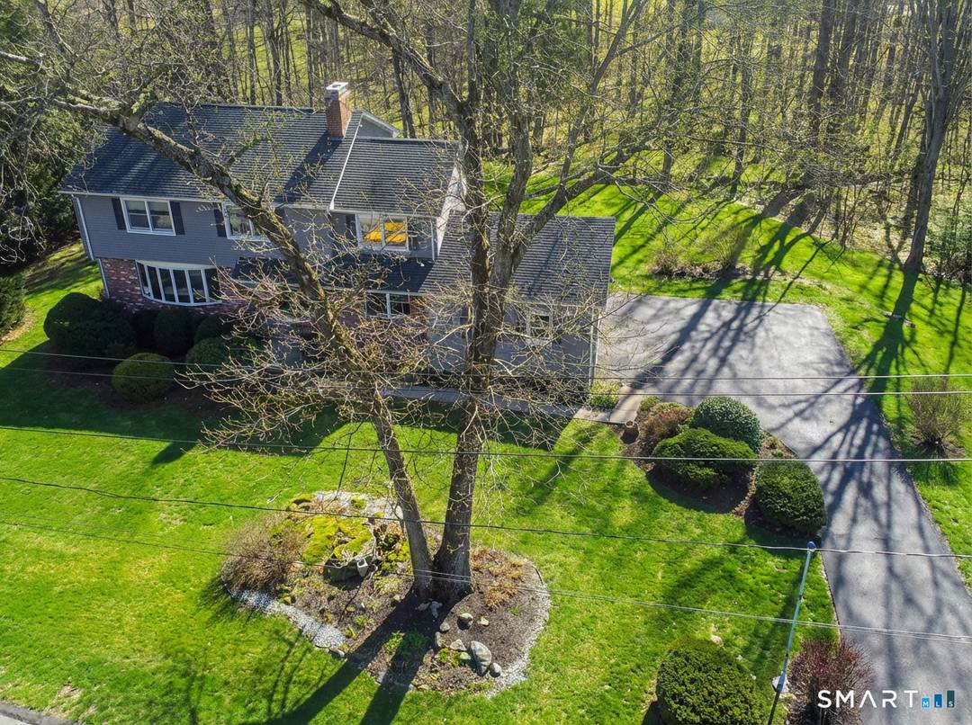 Nestled in the desirable Whitney Farms subdivision, this charming 4 bedroom, 2.