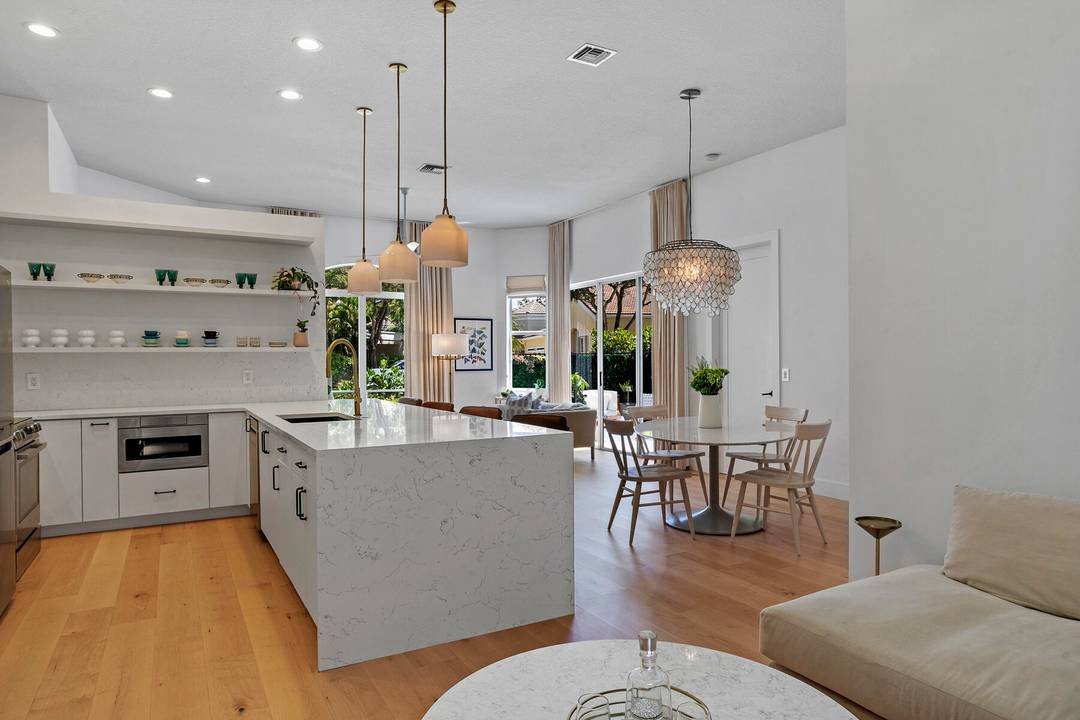 This renovated townhome is set within Larkspur Landing, a charming Mediterranean enclave inside The Club at Ibis.