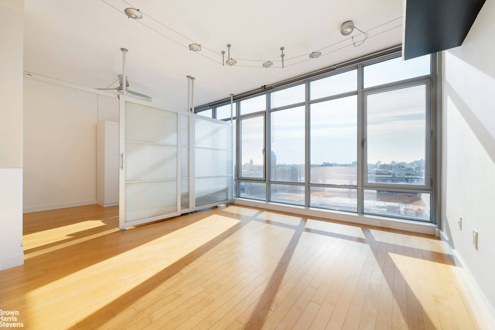Welcome home to this sunny and expansive alcove studio located in Williamsburg's luxury waterfront condo, Northside Piers, complete with central air and in unit washer dryer.