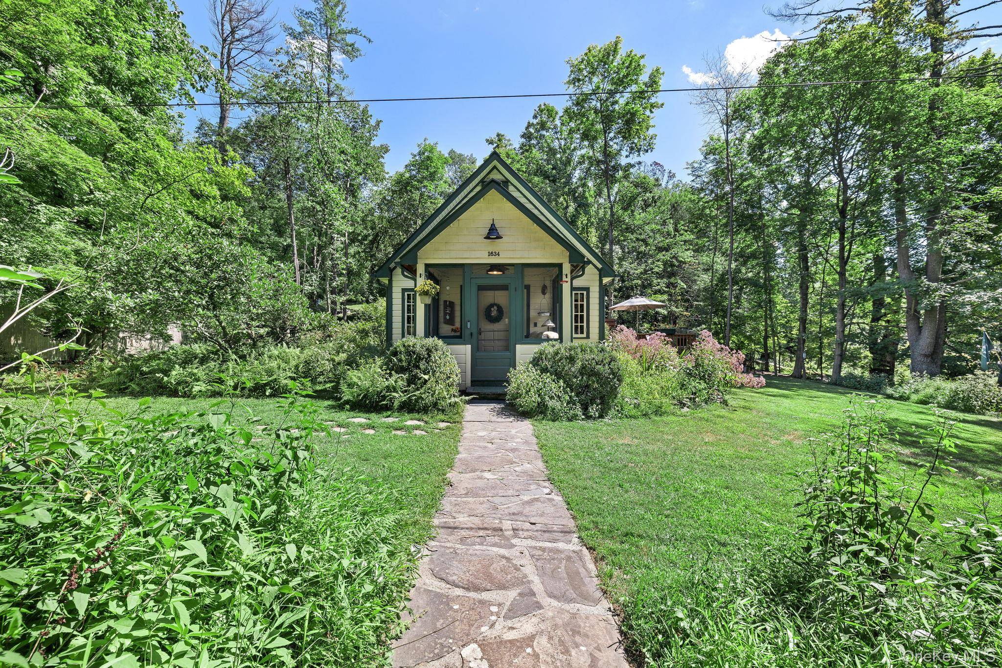 Nestled on a coveted, peaceful country road situated between two amazing natural features, sits your new investment or vacation home.