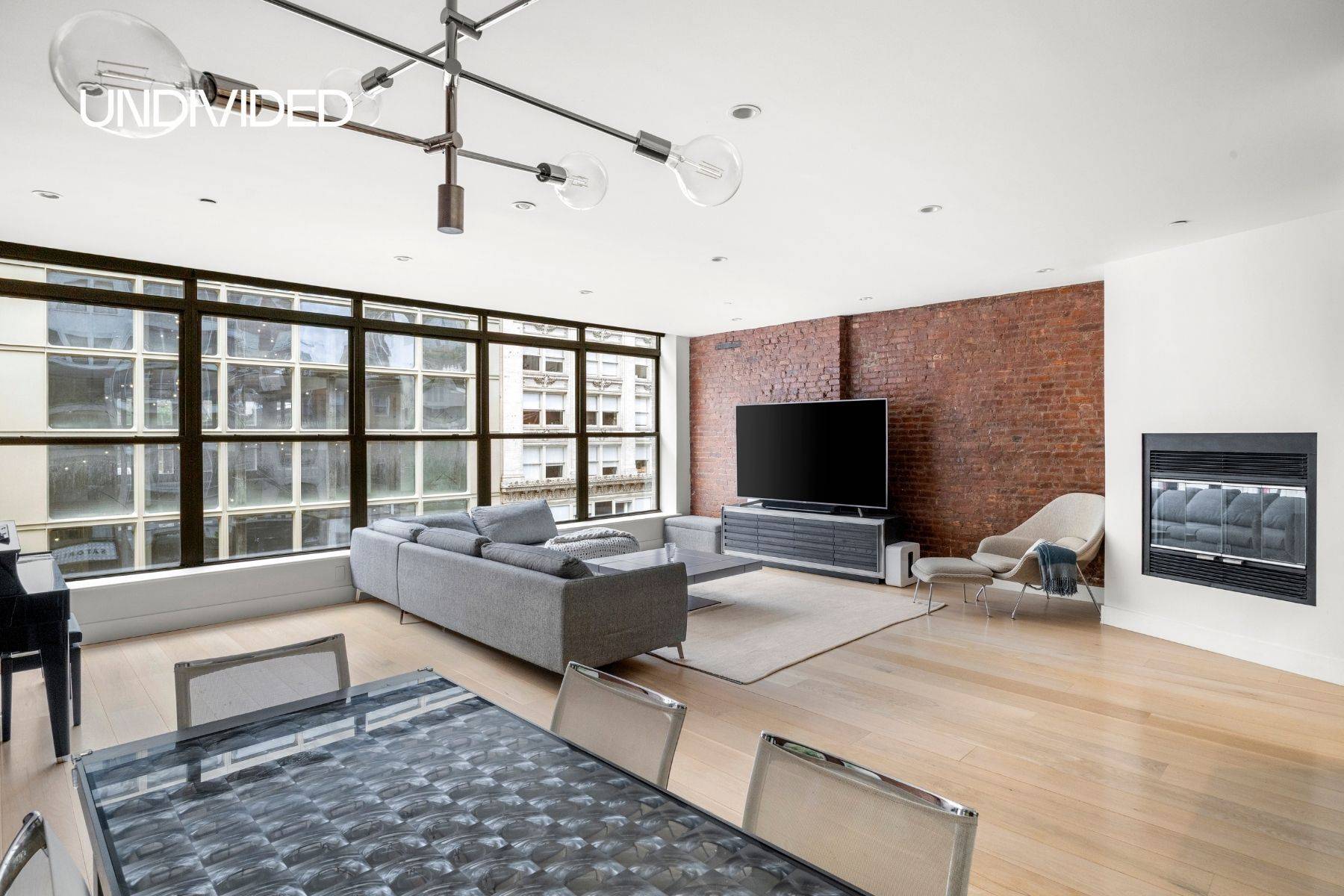 Welcome to Loft 4 at 133 West 14th Street, a renovated 2 bedroom, 2 bath condominium spanning approx.