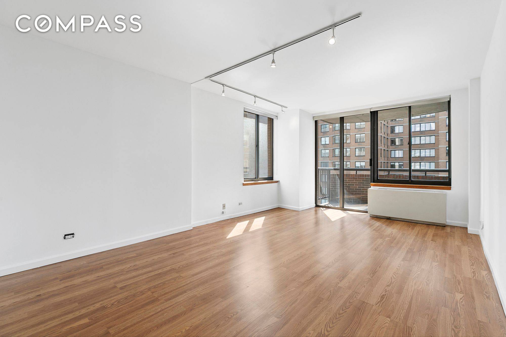 Sunny and spacious two bedroom two bath condo with city views and two large private balconies in a prime Kips Bay full service building.
