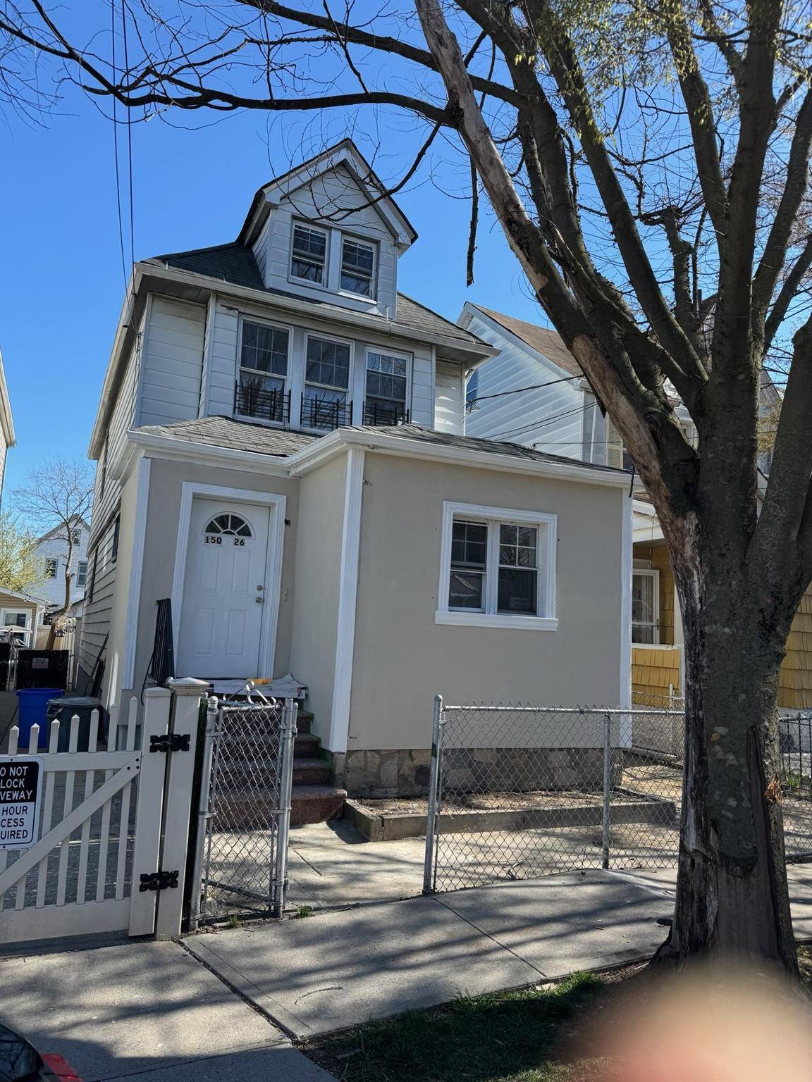Detached 2 family property with newly renovated interior with hardwood floors, new kitchen, new bathrooms with new cabinets and granite countertops.