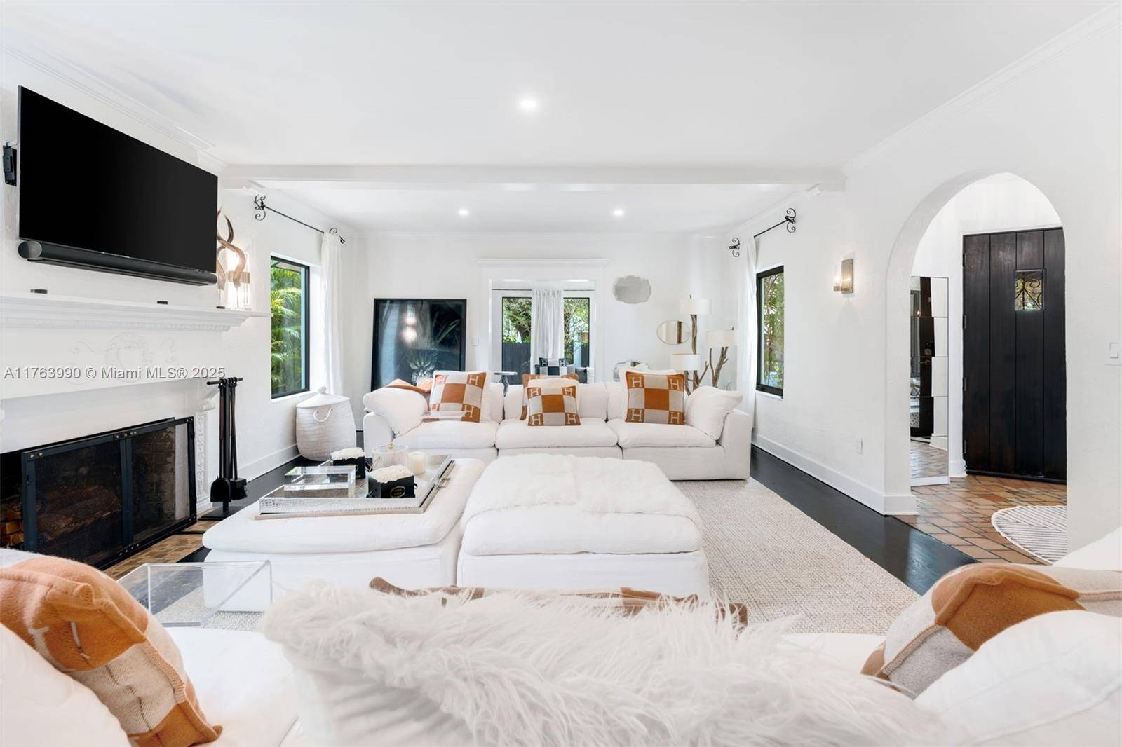 Experience luxury living in this exquisitely remodeled Mediterranean home nestled in the heart of Miami Beach.