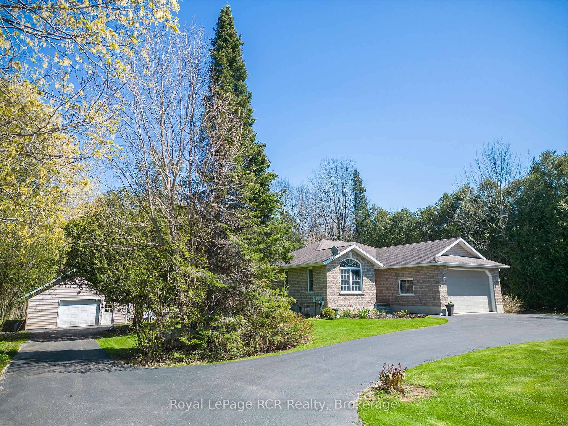 Welcome to 318783 Grey Road 1 ; a beautiful, move in ready, detached bungalow.