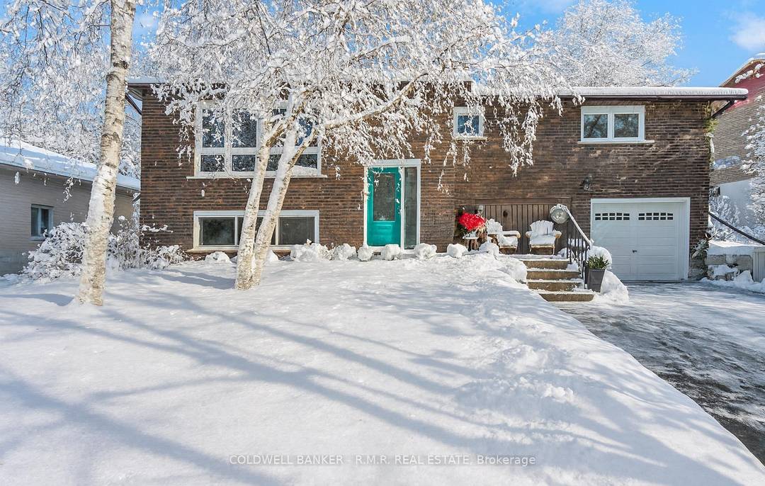 Welcome to 77 Main St N, Uxbridge, a beautifully renovated raised solid brick bungalow set on a generous 66 ft x 165 ft lot in a prime location.