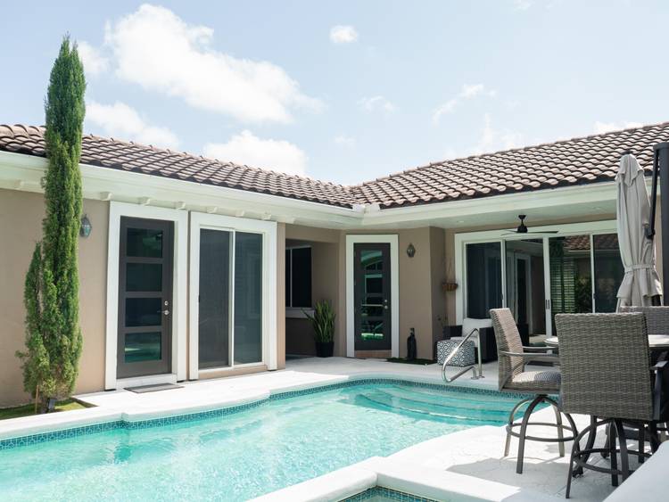 The main house offers 3 bedrooms and 2.
