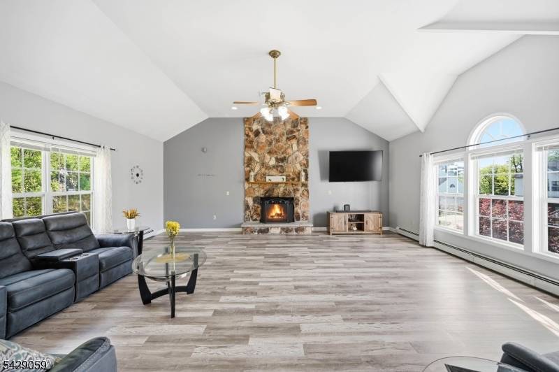 Spacious, stylish home w soaring ceilings in Olde Milford Estates Main level has kitchen, living room, formal dining room, Great room w cathedral ceiling fireplace and br office with a ...