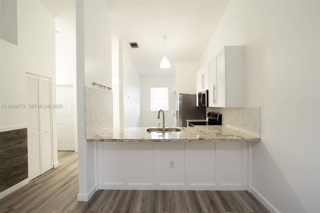 COME AND SEE this stunning and impressive 2 bedroom, 2 bath townhome, thoughtfully upgraded to offer a fresh, modern living experience.