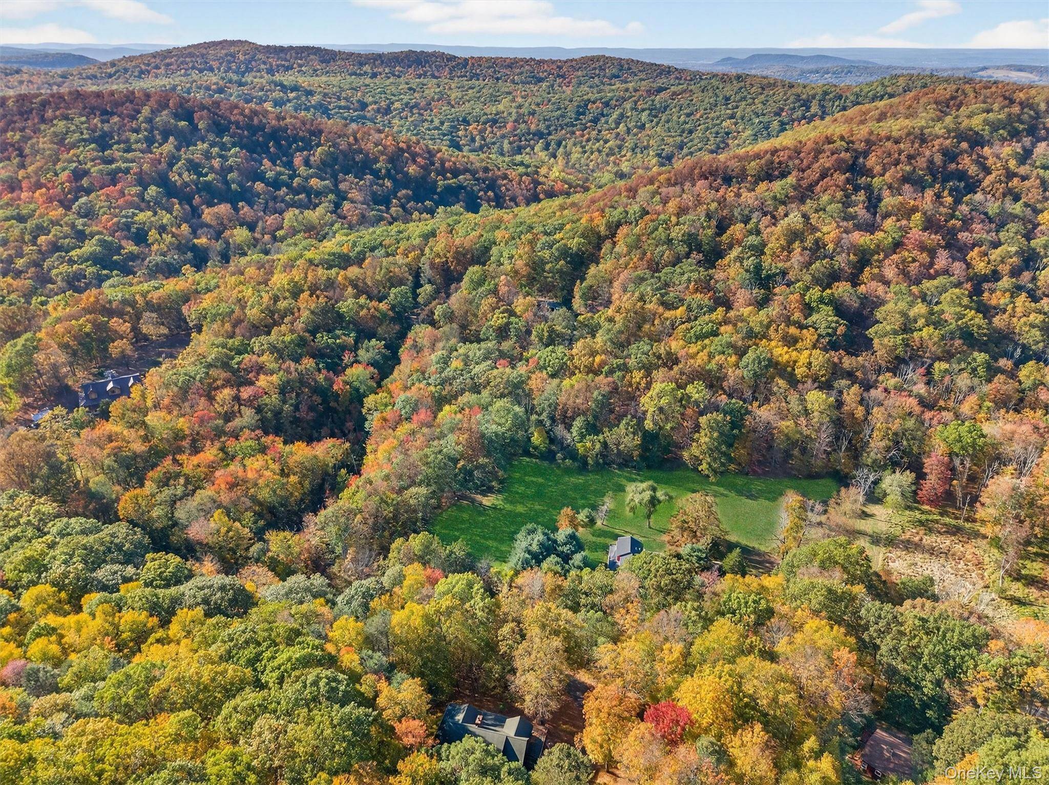Stunning Private Retreat 8 Acres with Custom 3 Story Log Cabin in Warwick.