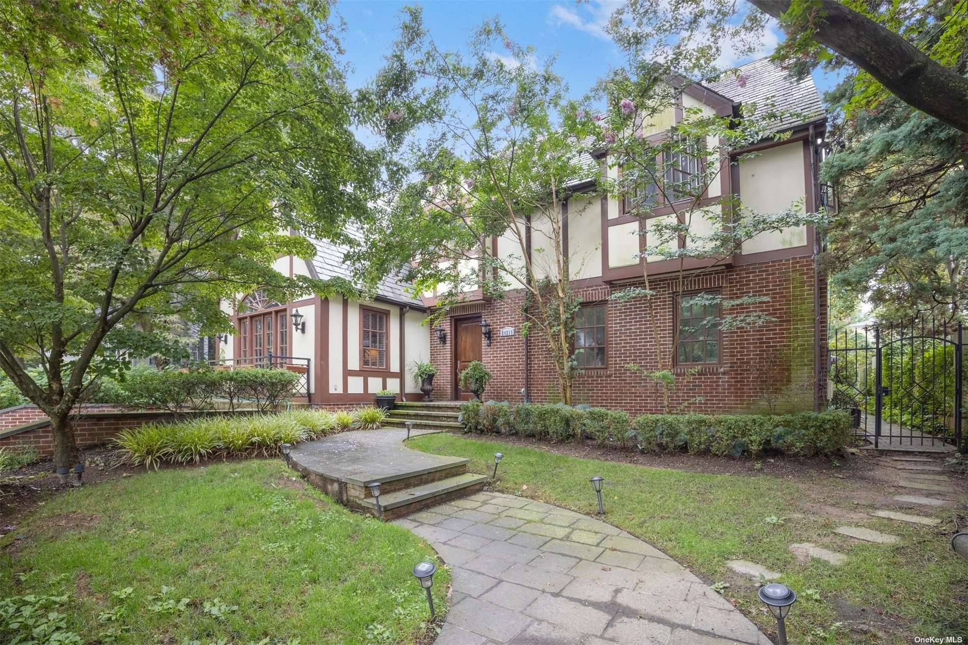 THIS IS IT ! ! ! This absolutely stunning and classic TUDOR sits on a 192' deep lot with a huge in ground, heated salt water pool Vaulted ceilings, 4 ...