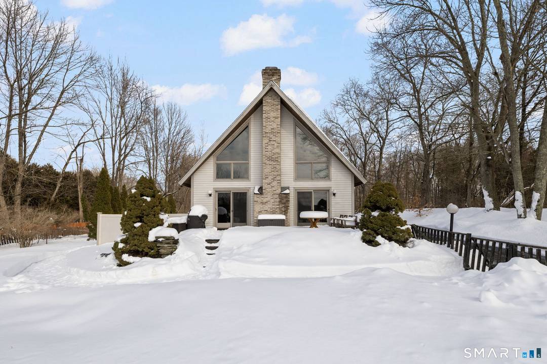 Striking west facing A Frame contemporary designed to capture natural light and stunning sunset views through expansive front windows.