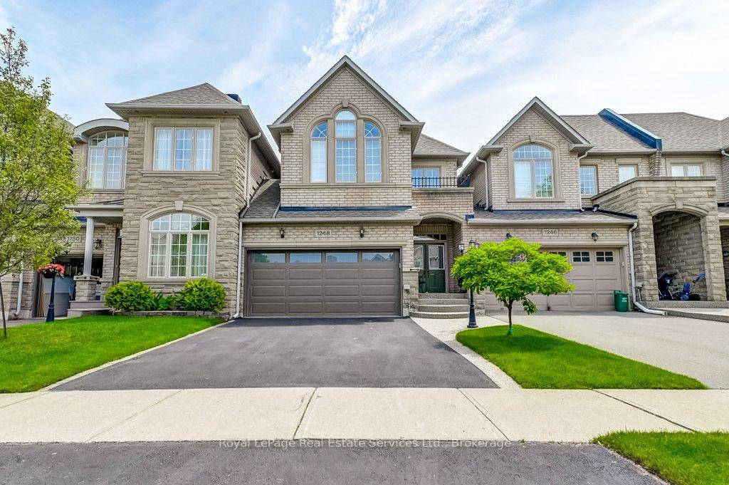 This lovely, large 3 bedroom townhome feels more like a semi, because it is only linked at the garage.