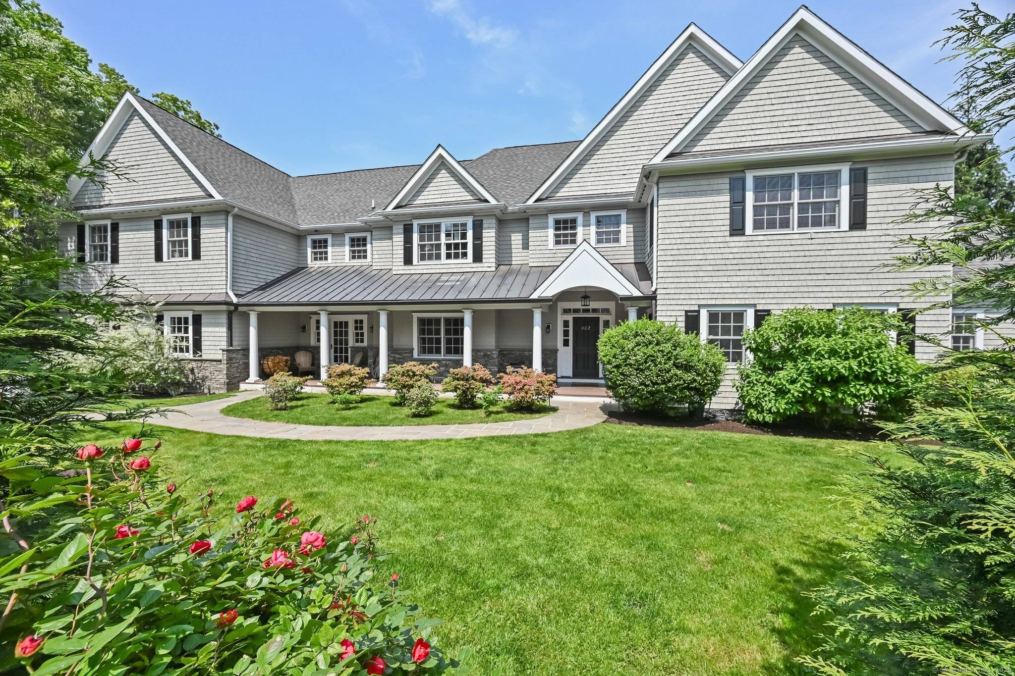 A rare opportunity to own a truly turn key, updated Colonial in one of the most charming coveted neighborhoods in New Canaan.