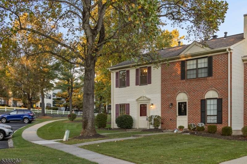 Welcome to this sun filled townhouse end unit in Basking Ridge.