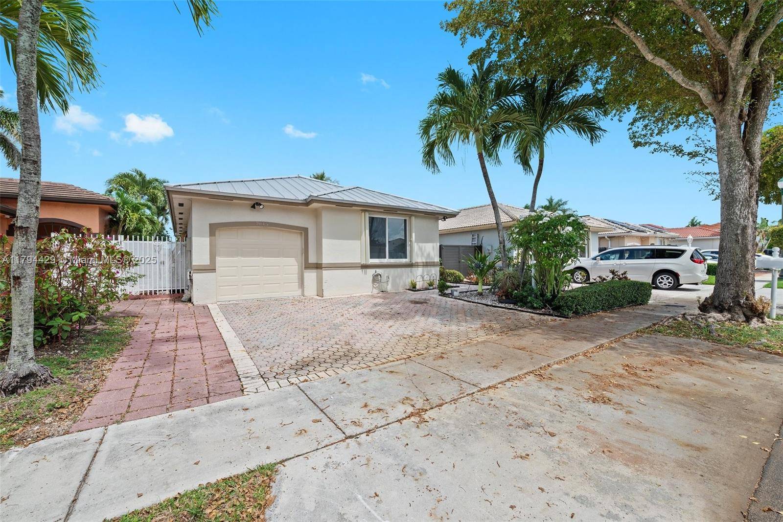 Welcome to this charming three bedroom, two and a half bathroom home, where comfort meets style !