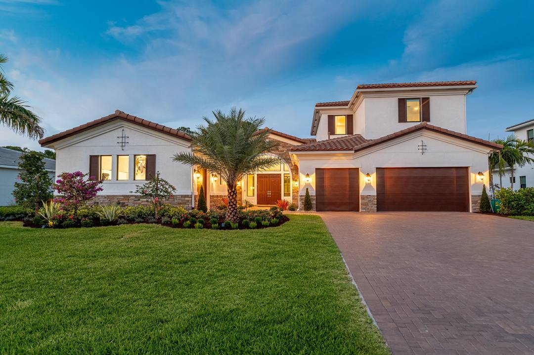 This expansive 6BR, 6. 5BA home offers space to live, work play.