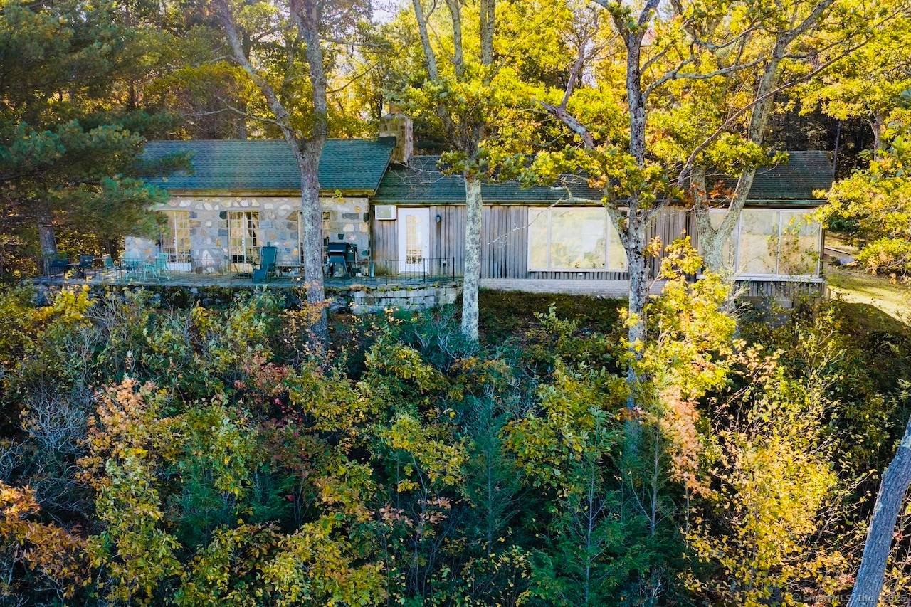Perched high above the iconic West Cornwall Covered Bridge, this remarkable property offers some of the best views in Cornwall and possibly all of Litchfield County.