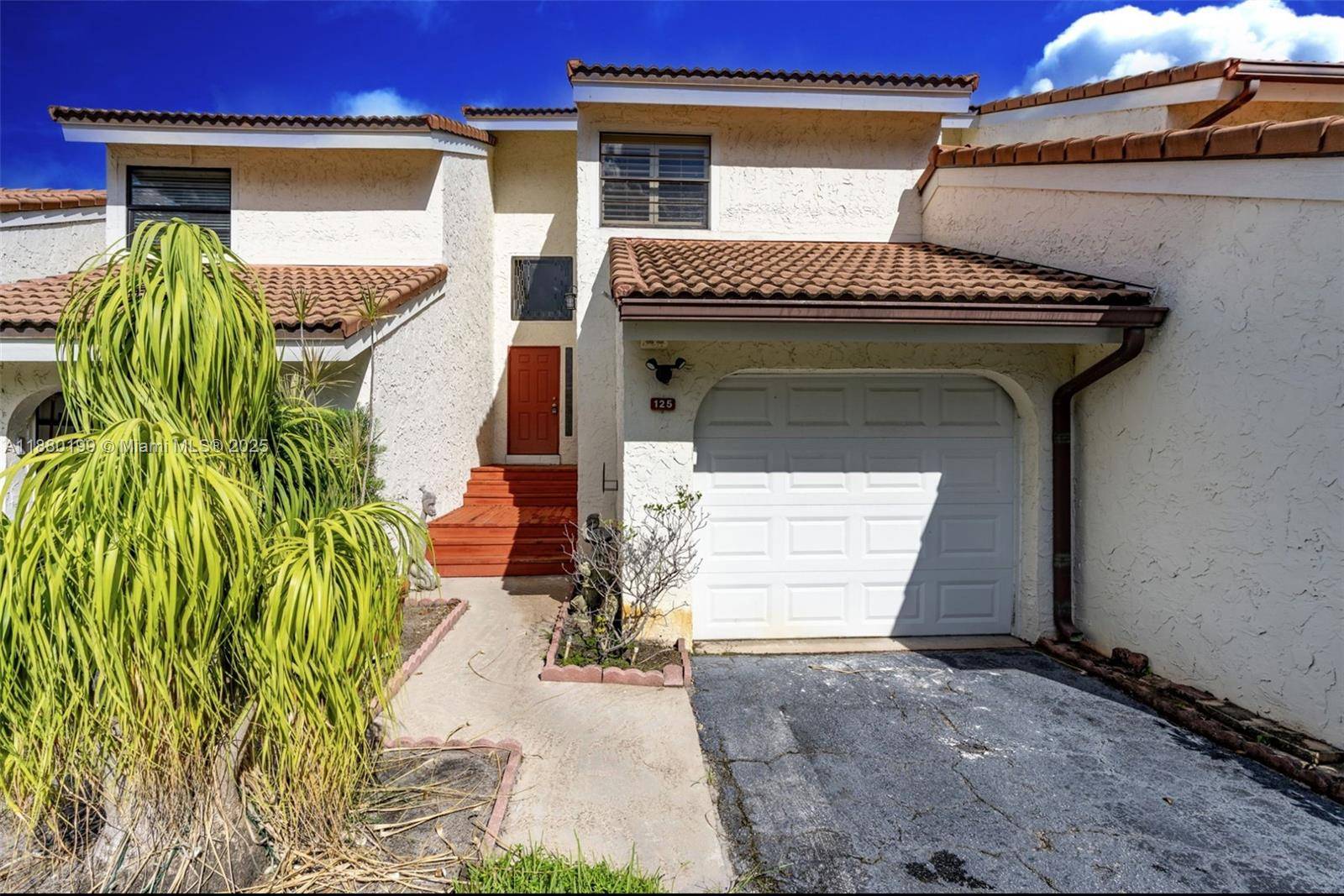 Welcome to this beautifully renovated, contemporary 3BR 2 Bath townhouse with beautiful views of the lake from your balcony or patio.