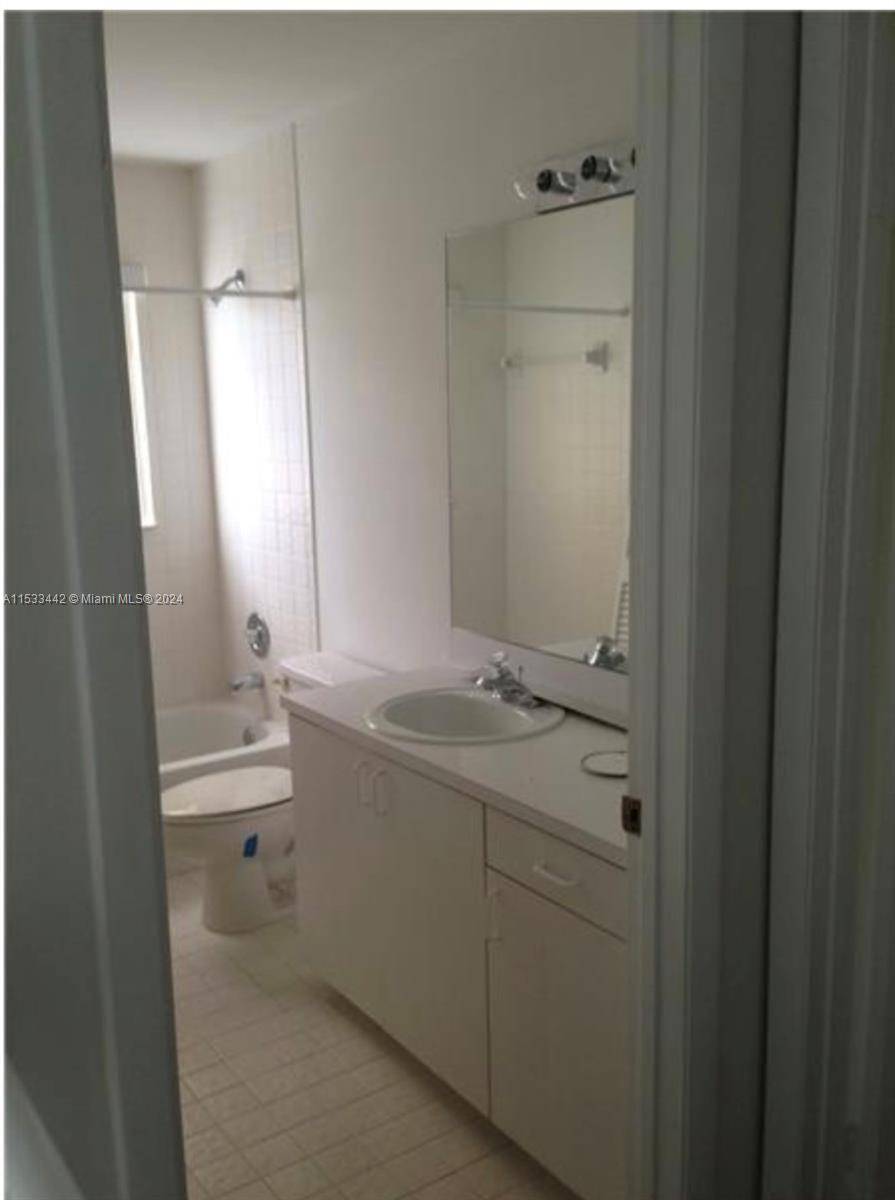 Newly renovated bathrooms, updated kitchen, stainless steel appliances, garden in back.