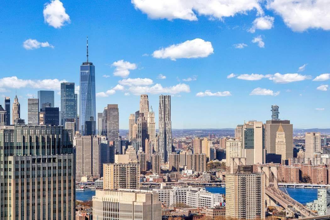 STUNNING VIEWS, 5 STAR AMENITIES AND THE LAST 25 YEAR TAX ABATEMENT Rarely available, residence 48A is a mint condition 2 bedroom, 2 bath corner home facing West and North, ...