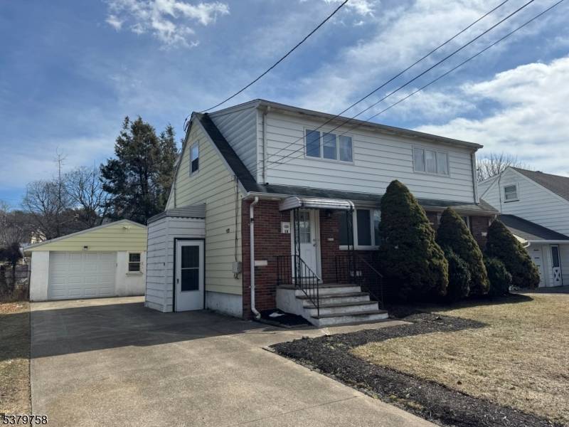 Welcome to this beautifully maintained four bedroom, two full bathroom home nestled in the heart of Woodland Park.