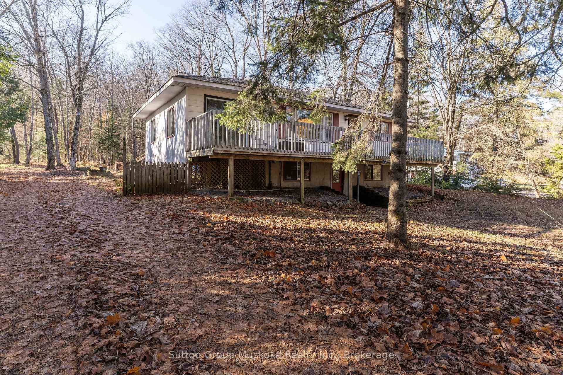 Well priced raised bungalow with a private backyard, workshop, some new renovations AND within walking distance for a swim !