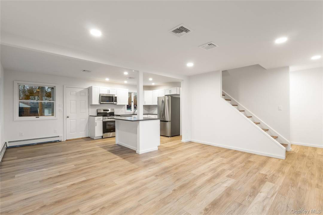 This beautiful fully renovated 4 bedroom, 2 bath home offers a perfect blend of modern comfort and east end charm.