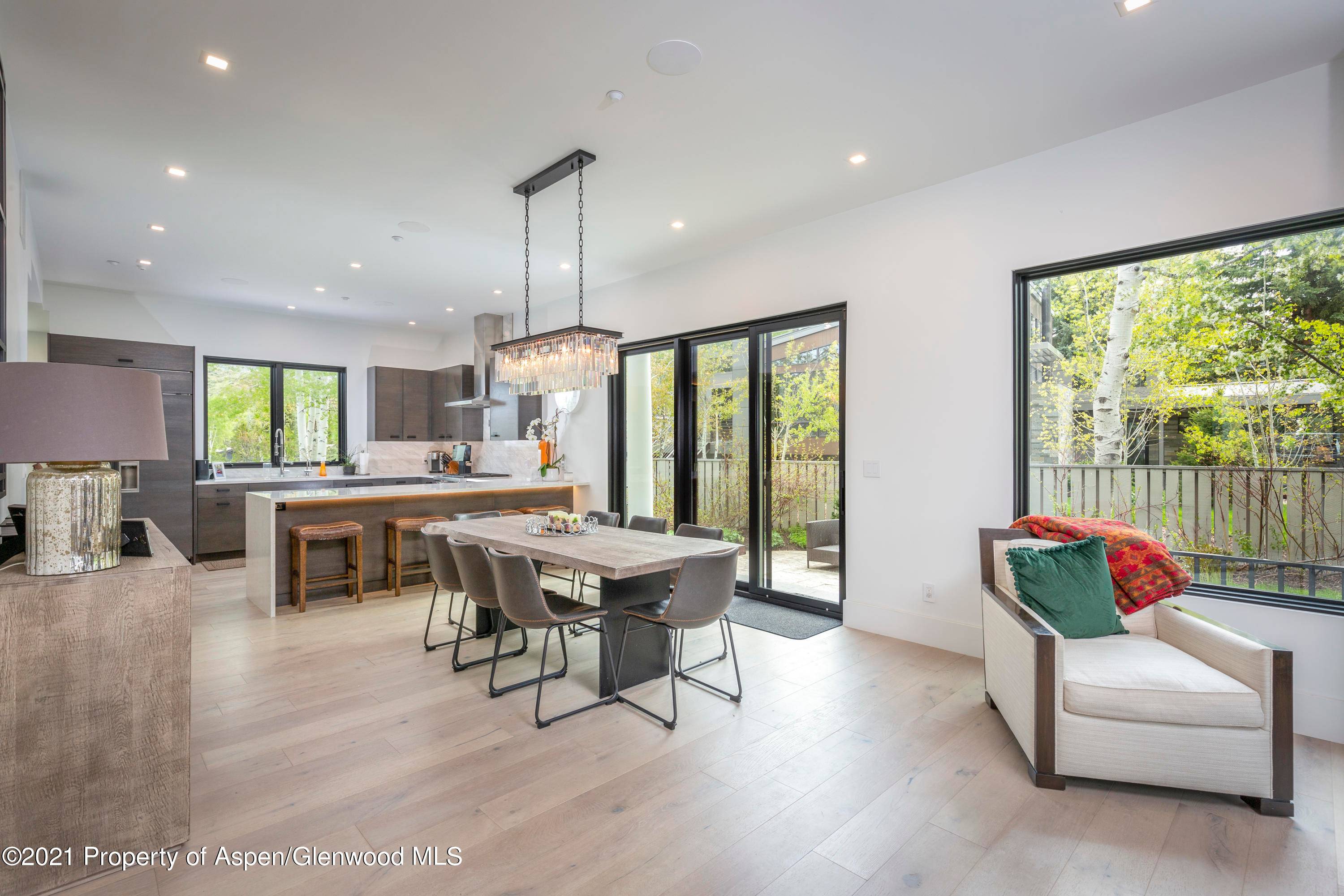 This stunning mountain contemporary Duplex, located by the Aspen Golf Course on a private cul de sac, is a must see.